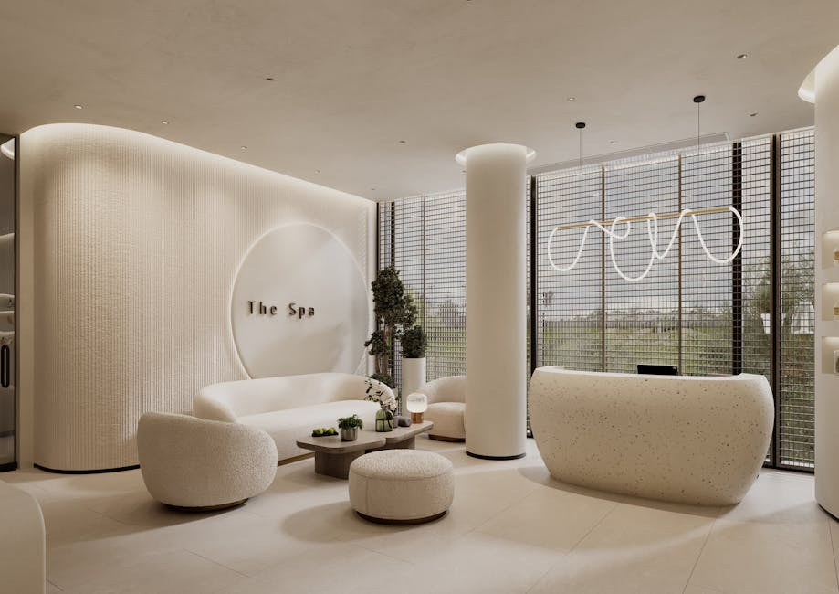 A serene and minimalist spa interior featuring curved furniture and natural light. Perfect for relaxation.